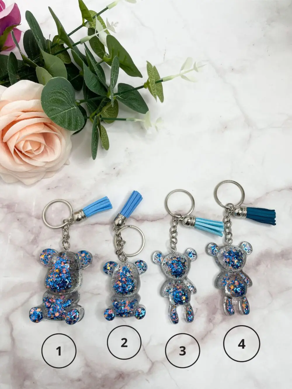 Porte clé en résine - idées cadeaux - boutique en ligne - Porte clé ourson bleu paillettes - boutique idées cadeaux - boutique en ligne - création française et artisanale.