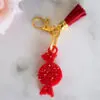 Porte clé bonbon diamant rouge clair - Boutique en ligne d'idées cadeau et de décoration résine jesmonite badges et stickers