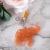 Boutique en ligne d'idées cadeaux et de décoration pour la fête des mères, la fêtes des pères ou pour un anniversaire enfant ou adulte, pour les fêtes de Noël ou pour tout autre occasion Porte-clés diamant éléphant - Résine - Marron clair Porte-clé Eléphant effet diamant